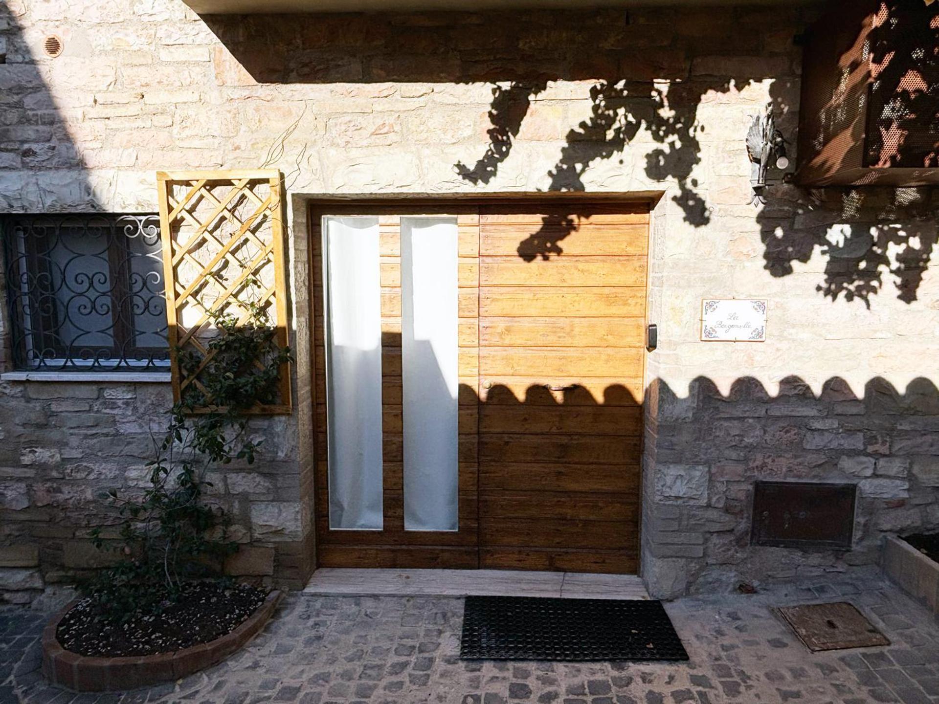 La Bouganville Assisi Bagian luar foto